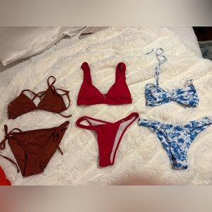 Never worn bikini sets- not $100 read description